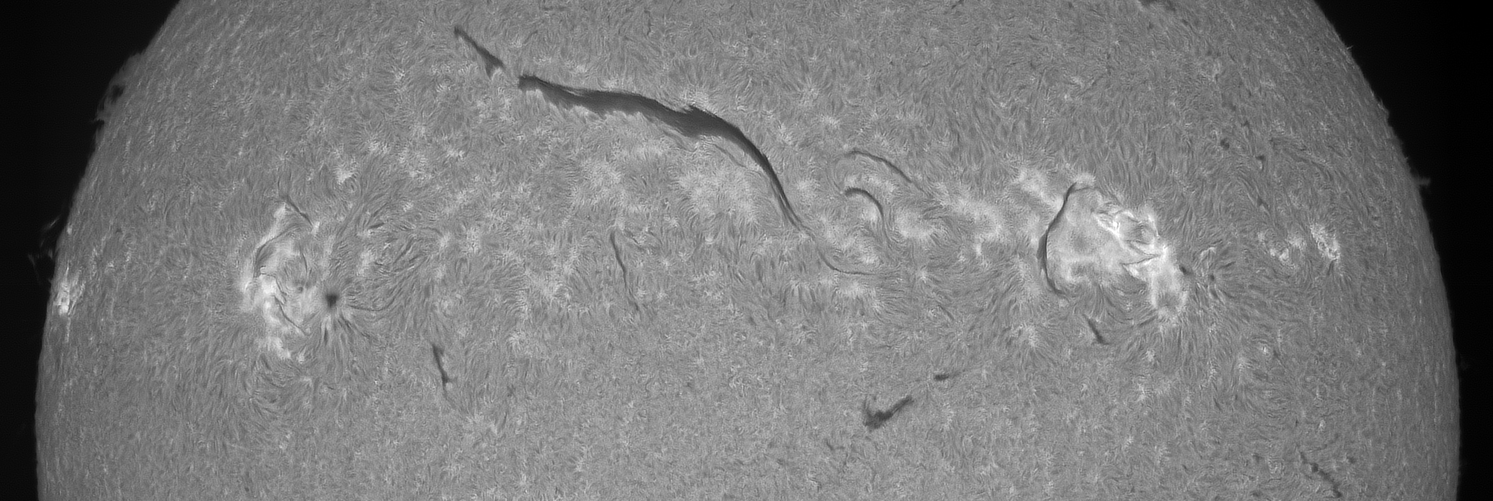 H-alpha SHG, closeup of AR 3057 and 3053. Video data taken 07:03 to 07:09 UTC.