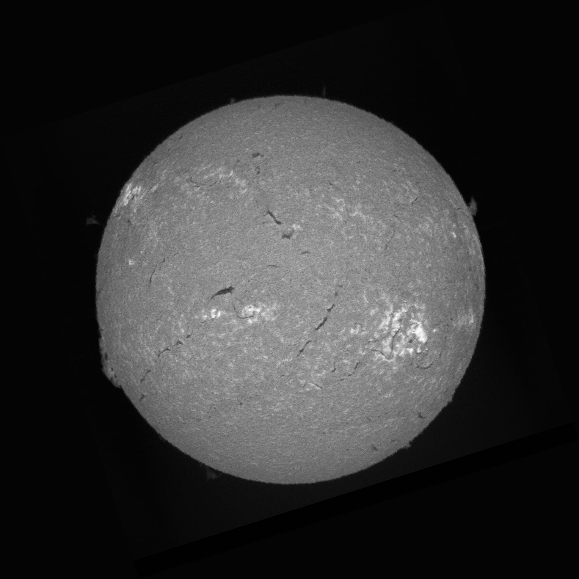 H-alpha. The prom at 8-oclock is the sunspot region rotating into view, that gave us the auroral display on May 10.